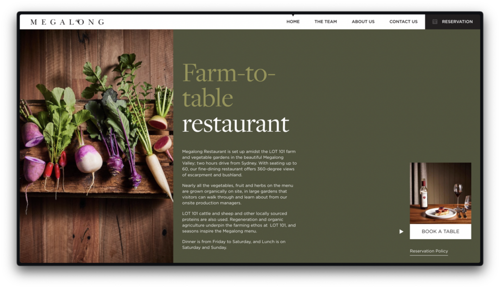 Website homepage designed by a top Web Design Melbourne agency for Megalong farm-to-table restaurant, featuring a lush image of fresh vegetables and herbs on the left, with navigation links and restaurant information on a dark | Ven Agency